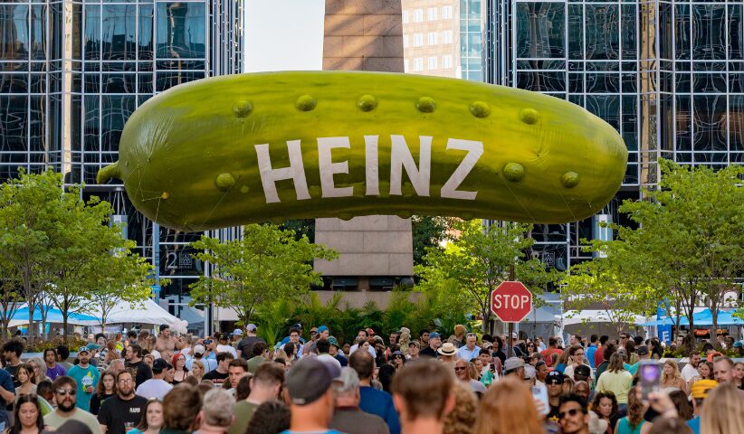 The Heinz Pickled balloon looms over a crowd of excited markey attendees in Market square.